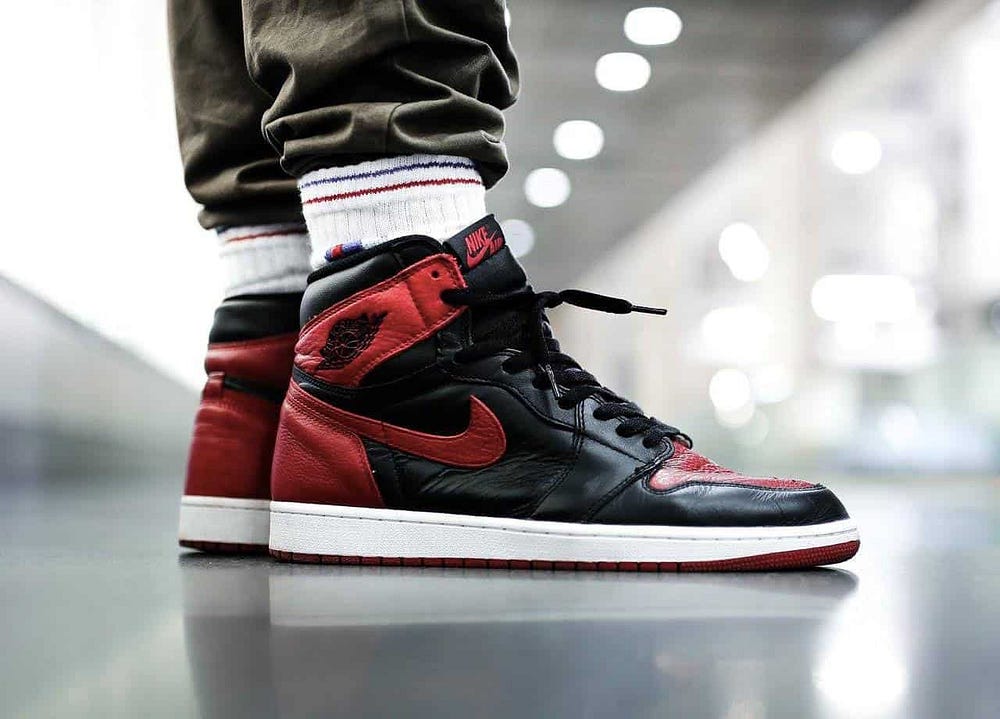 How To Spot Fake Air Jordan 1 Bred Banned (Newer Releases) | by Legit Check  By Ch | Medium