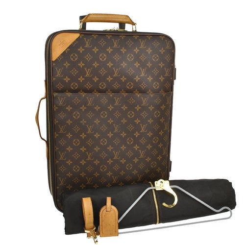 Please HELP IDENTIFY A LOUIS VUITTON BAG I GOT AS A GIFT FROM AN EMPLOYEE  AT LV!