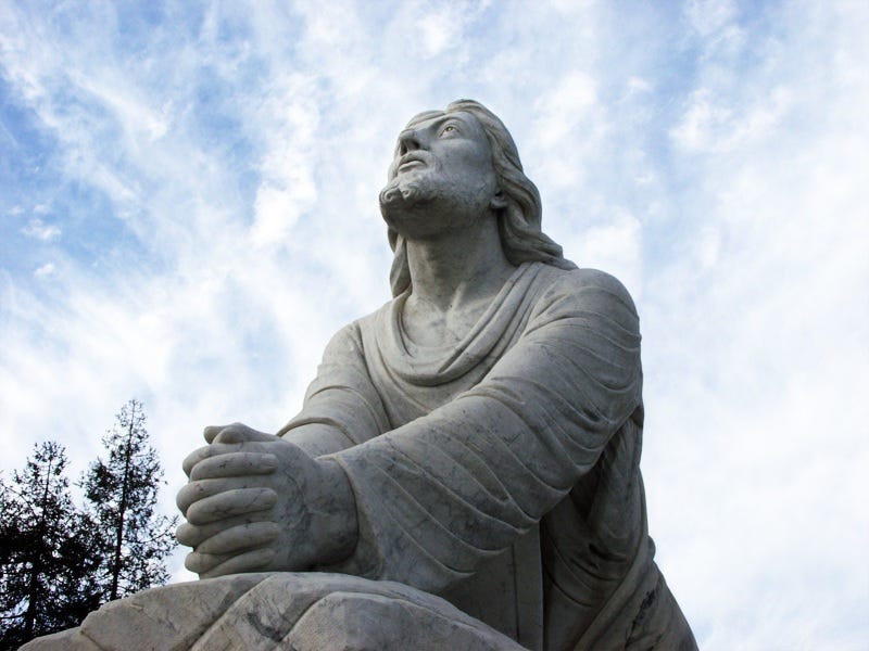 jesus-statue-with-cloudy-sky