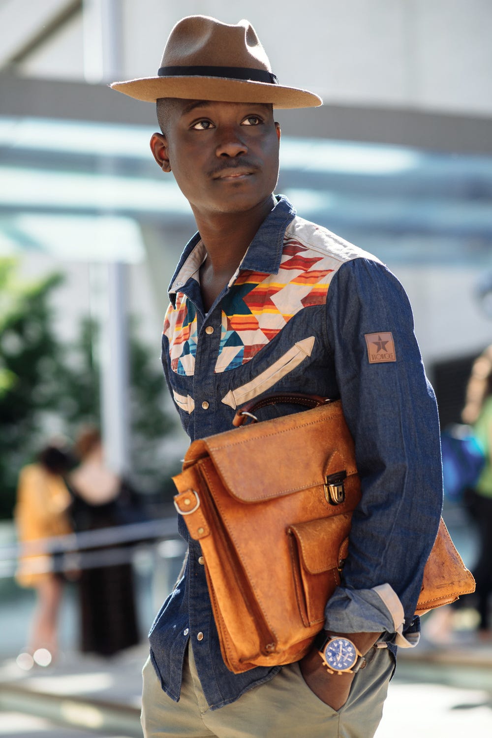 men carrying tote bags
