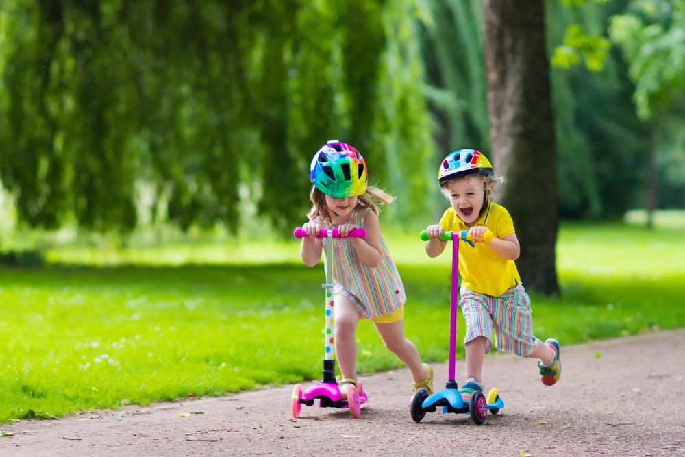 kids playing scooter