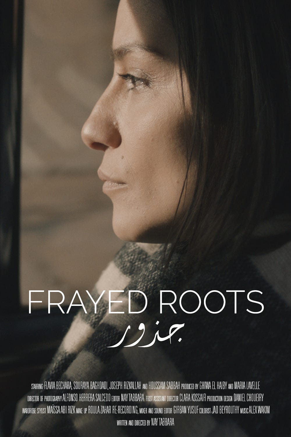 The profile of a woman with “Frayed Roots” overlaying the image.