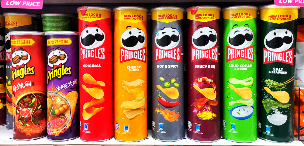 Pringles small can winks, while the big can has its eyes wide open. : r ...