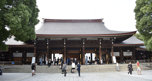 People outside courtyard of Meiji shrine.