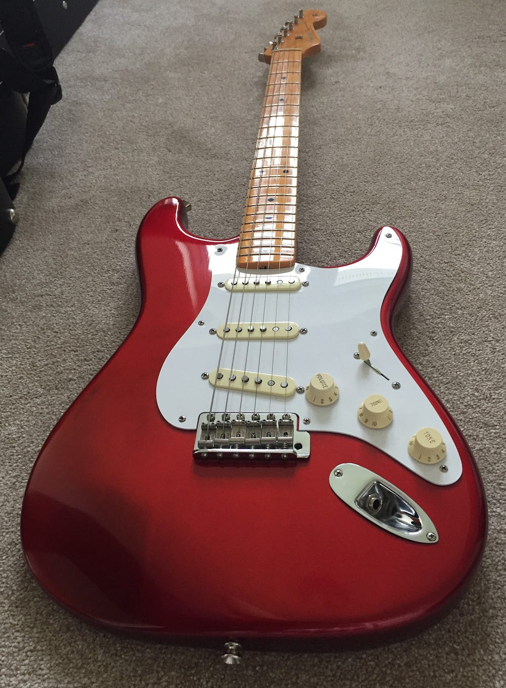 New Guitar Day: Fender USA '57 Vintage Reissue Stratocaster Candy Apple Red  with lacquered maple neck and fretboard | by Jonathan Thomas | Red Chair  Riffs | Medium