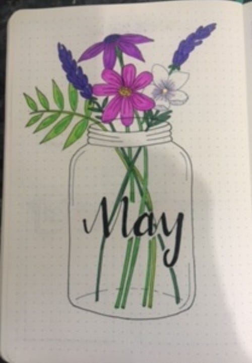 Drawn image of spring flowers in a glass jar for May Bullet Journal