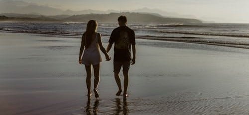 couple walking on the seashore