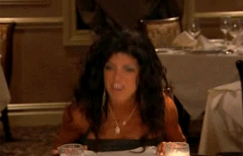 Teresa Giudice flips a table.