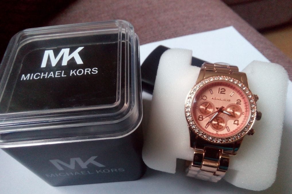 how to check authentic michael kors watch