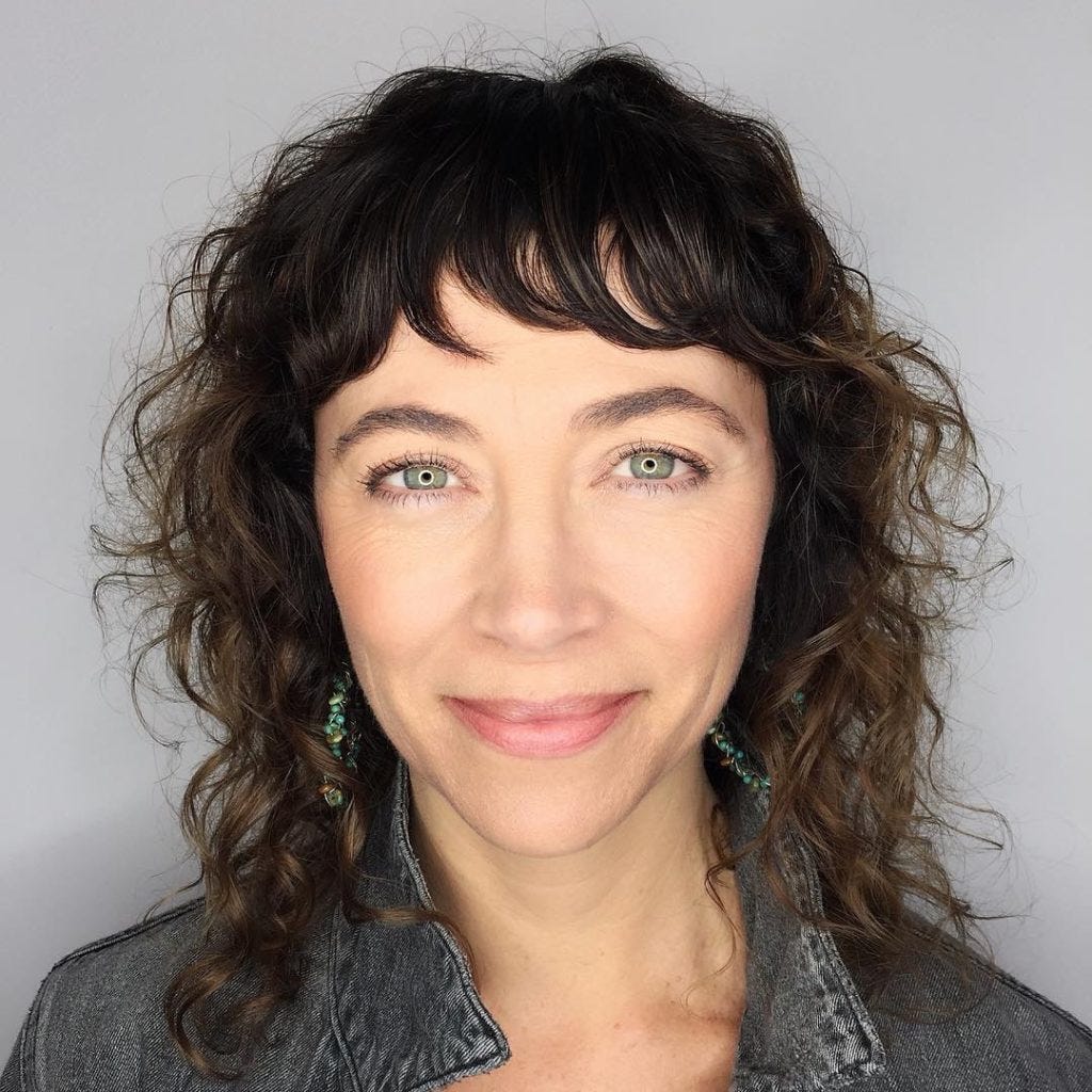Curly Hair With Short Pieced Fringe Bangs On Brunette Ombre Hair