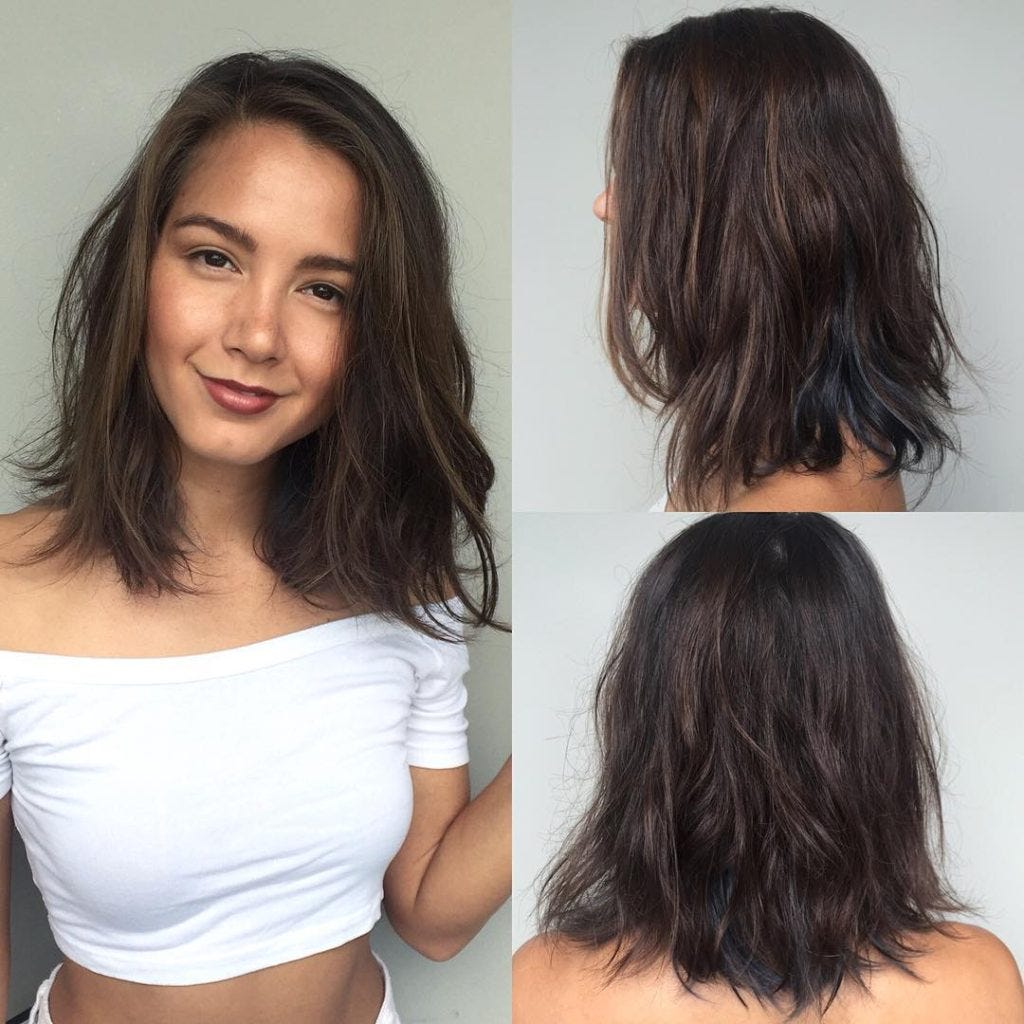 Brunette Layered Lob With Messy Beach Texture And Subtle Blue Peekaboo Highlights By Hairstyleology Medium