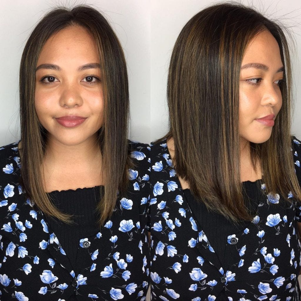 Sleek Angled Lob With Center Part And Caramel Highlights On