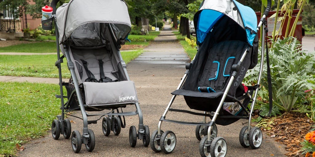 baby in umbrella stroller