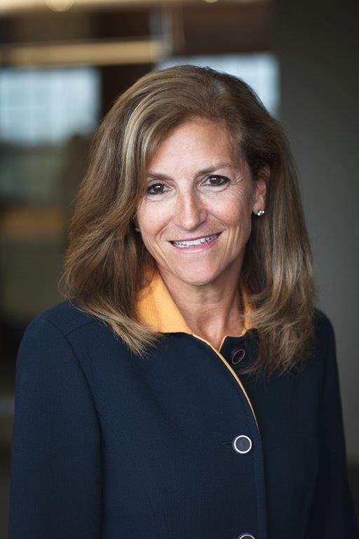 Image of Tanny Crane smiling at the camera.