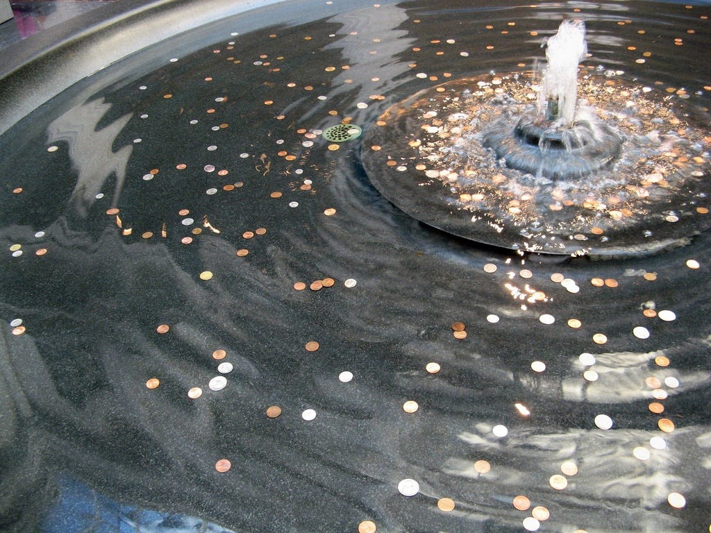 pennies-in-the-fountain-tossing-pennies-in-the-fountain-making-wishes