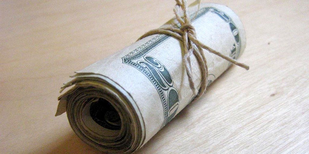 5 Pros And Cons of Keeping Cash in Your Pocket by PocketGuard