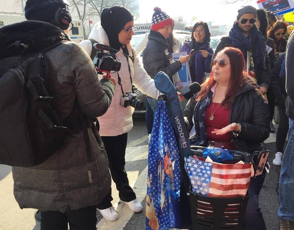 Picture of Kerry Wong in a scooter at Womens March