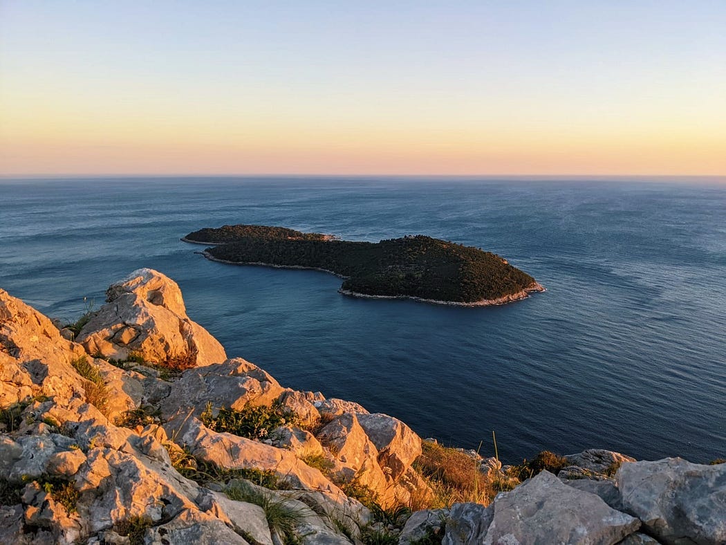 A view of Lokrum Island at sunset from Srd Mountain