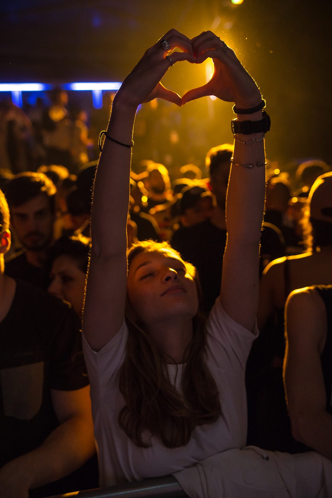 Club Goer making heart sign