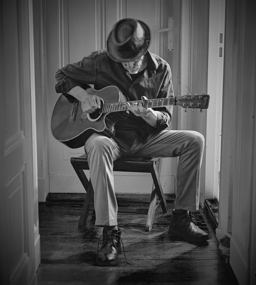 Sean P. Durham. Self Portrait while playing the guitar. Berlin, 2022