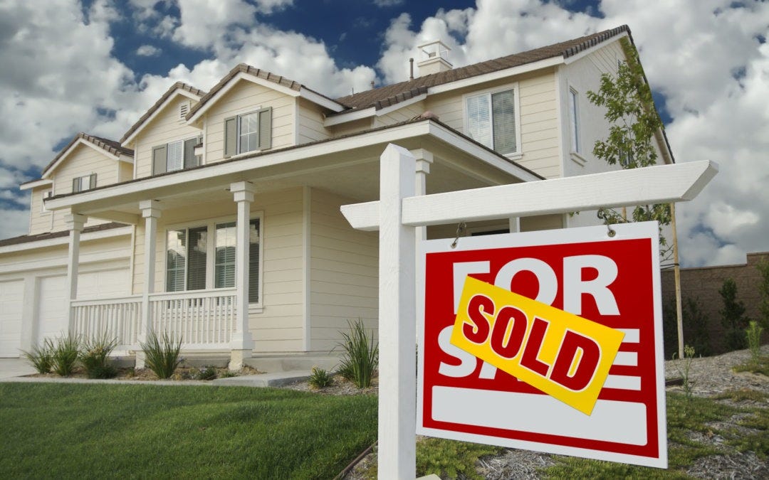 buying house while selling house