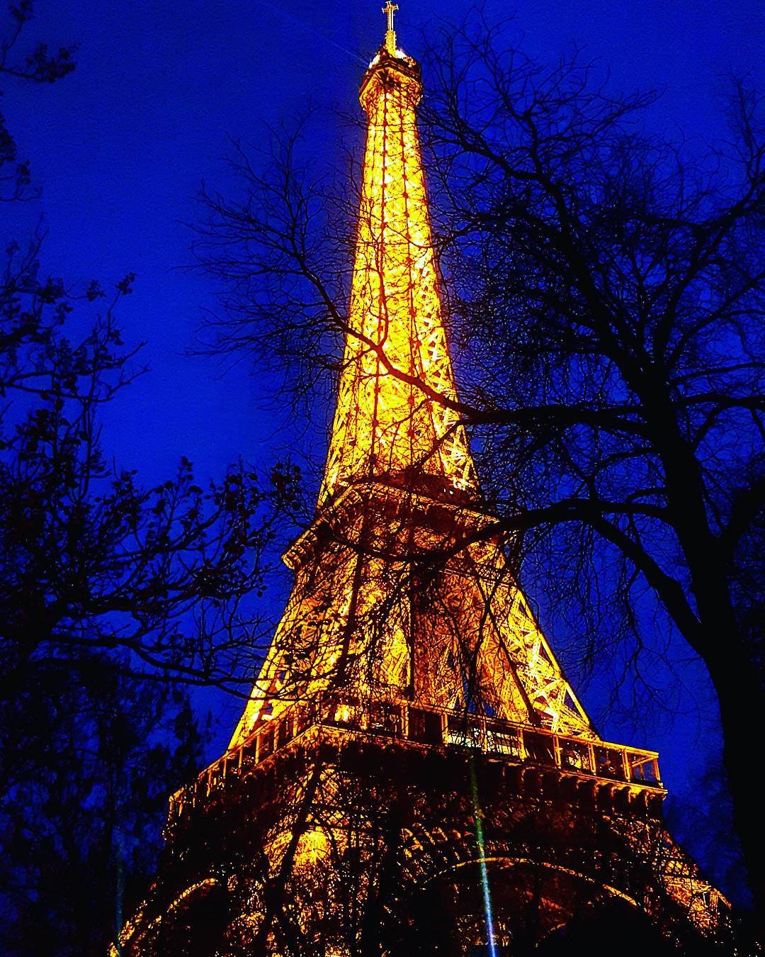 Well, excuse me while I glow away in the Twilight! #eiffeltower #eiffel #france #paris #travel #travelgram #traveling #travelphotography #travelling #wanderlust #explore #exploreeverything #tourism #toureiffel #tourist #europe #world #architecture #beautiful #twilight #sunset #lights #amazing #mojo #blog #instadaily #instagood #instamood #photooftheday