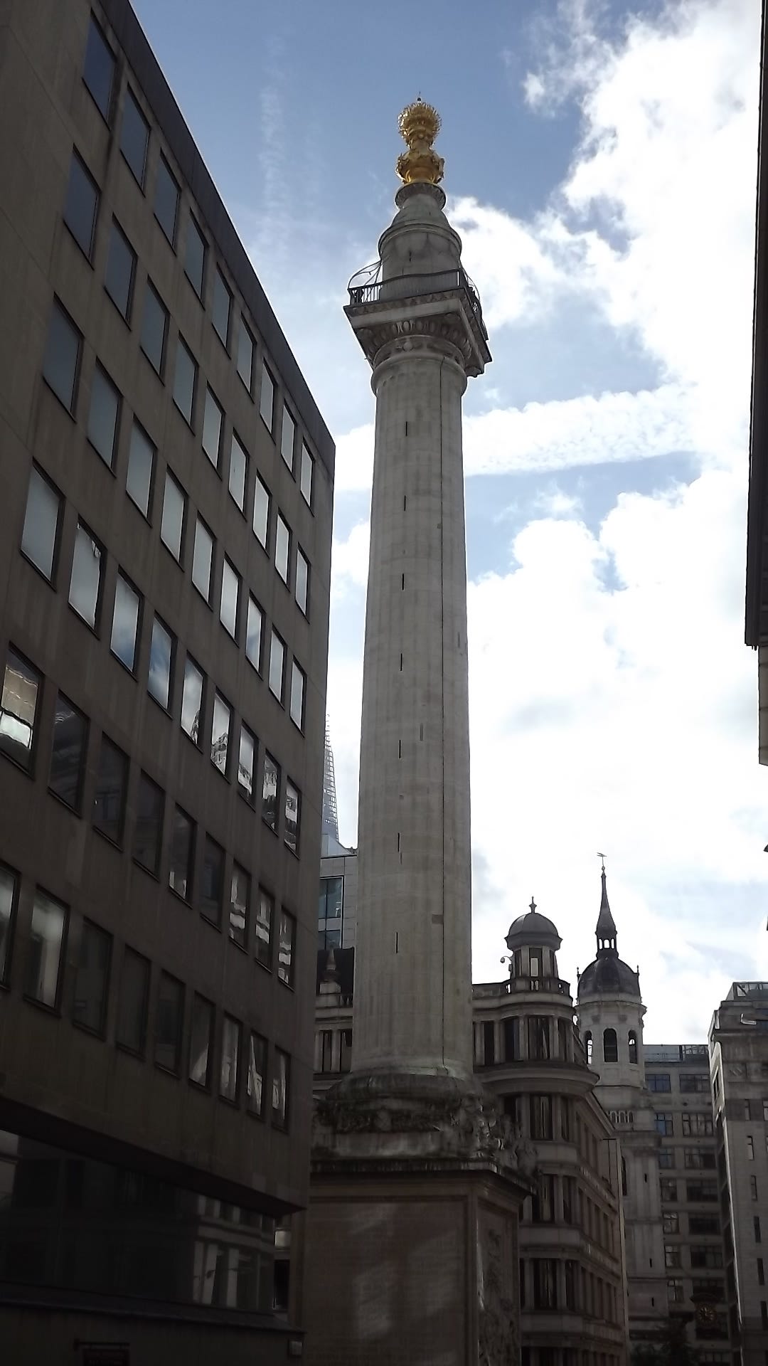 The Monument, London. Built to mark the site of the outbreak… by John Welford ILLUMINATION