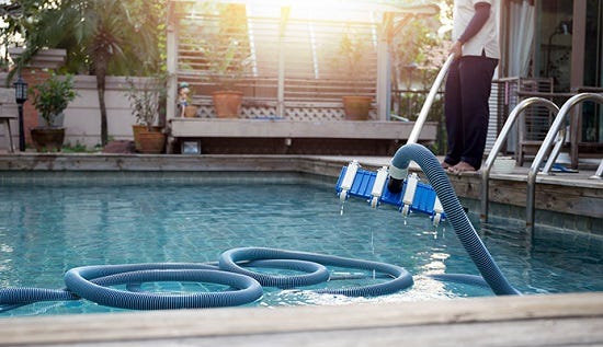Do you remove skimmer basket while vacuuming pool? by
