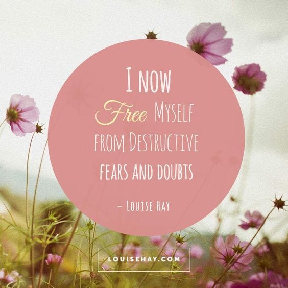 Pink cosmos flowers with the affirmation “I now free myself from destructive fears and doubts” by Louise Hay in a pink bubble