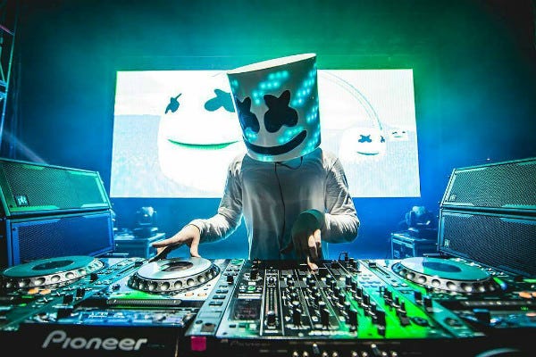 Marshmello DJing at EDM rave.