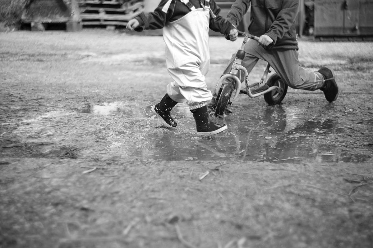 Teaching Our Kids to Play in the Rain by Chris b Medium