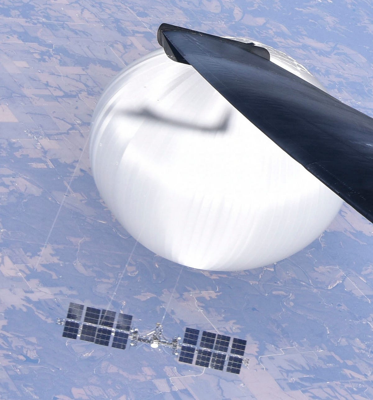 A photograph of the Chinese surveillance balloon as it hovered over the Central Continental United States on February 3, 2023, taken by U.S. Air Force pilot. (Image credit: Pentagon/Wikimedia)