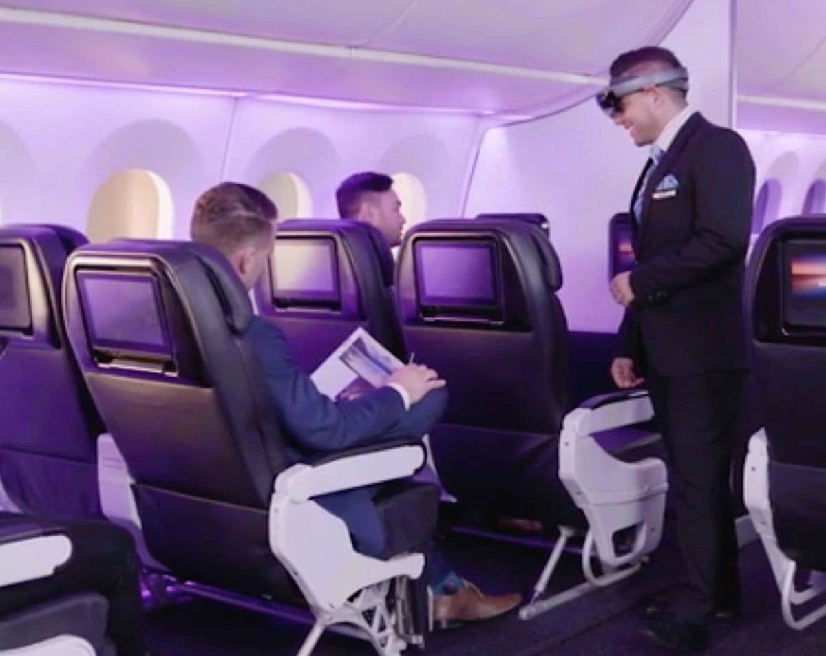 Flight attendants test mixed reality glasses to assist them in their