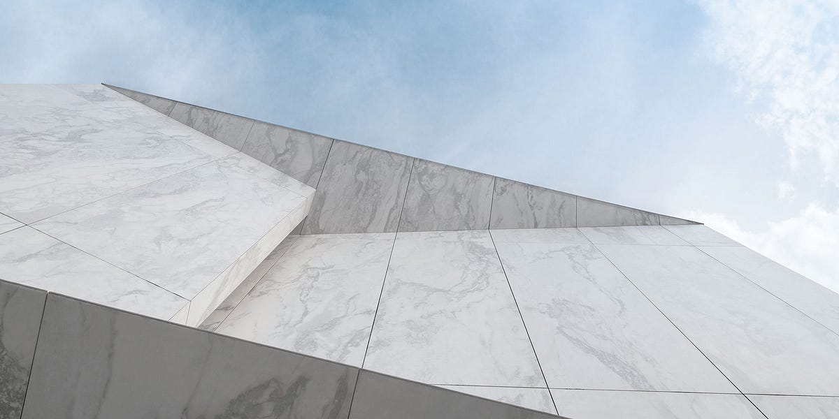 The Purity and Architectural Beauty of Marble Facades by TMD STUDIO