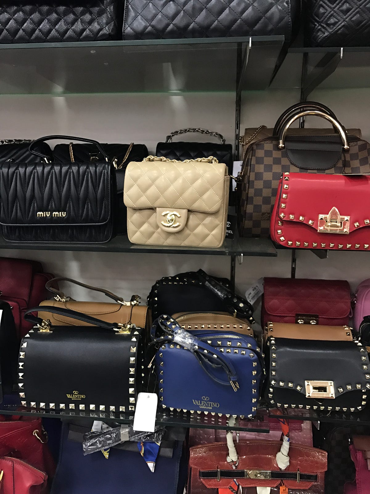 The Truth About Counterfeit Luxury Handbags - Becca Risa Luna - Medium