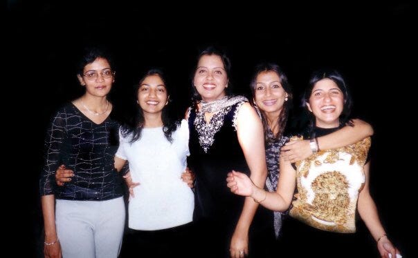 A photo of the Vinita, the author and four friends at a party many years ago