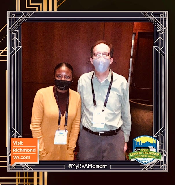DeBrittany & David pose for a photo at the CTAA Conference with frame that says, “My RVA Moment” (Richmond, VA)