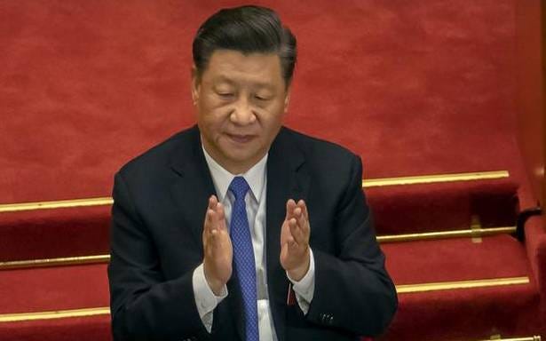 Pictured: Chinese President Xi Jinping illustrating roughly how many poor people are left in China.