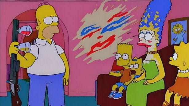 Image of Homer from The Simpson trying a make up gun on Marge as a representation of a bad design.