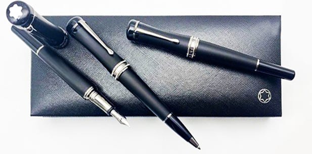 Black Montblanc writing instruments and case.