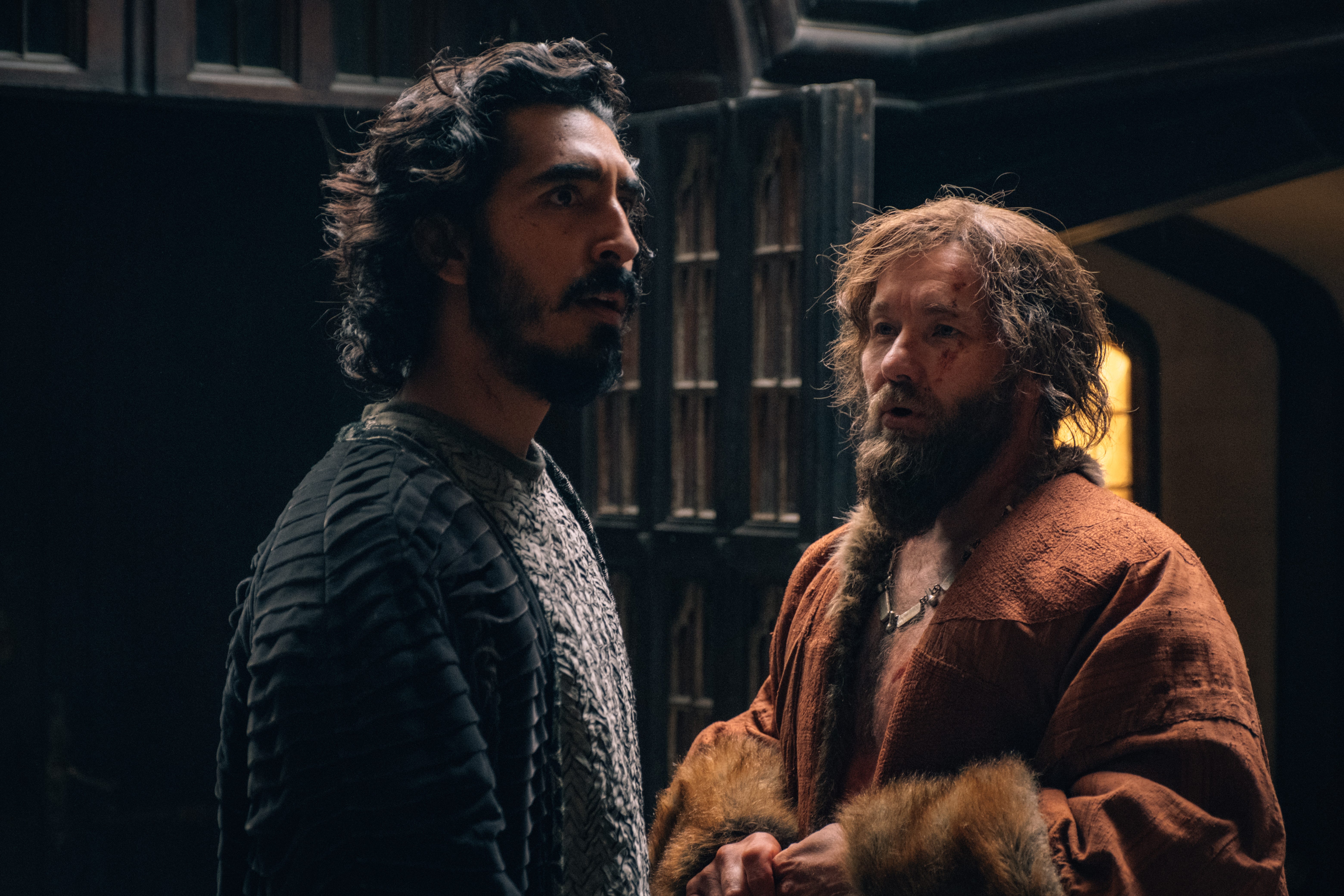 Dev Patel is hit on by a polyamorous lord, played by Joel Edgerton.
