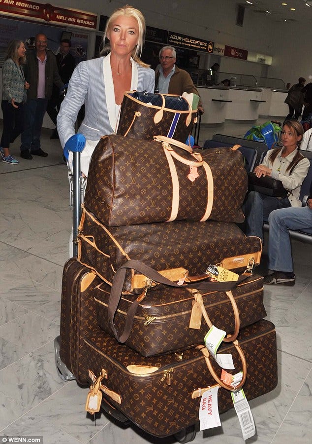 celebrities with away luggage