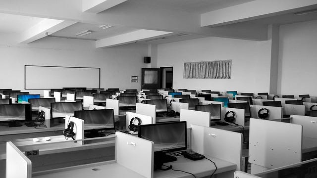 Computer classroom. Image by janeb13 from Pixabay.