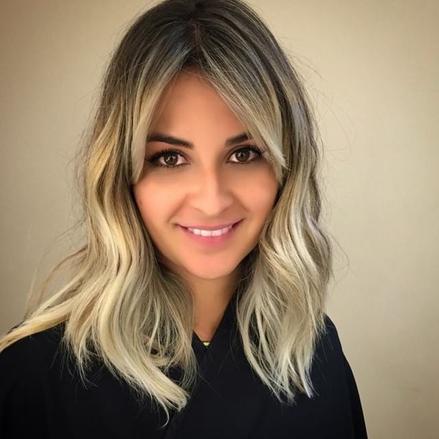 Long Wavy Hair With Center Parted Side Swept Bangs