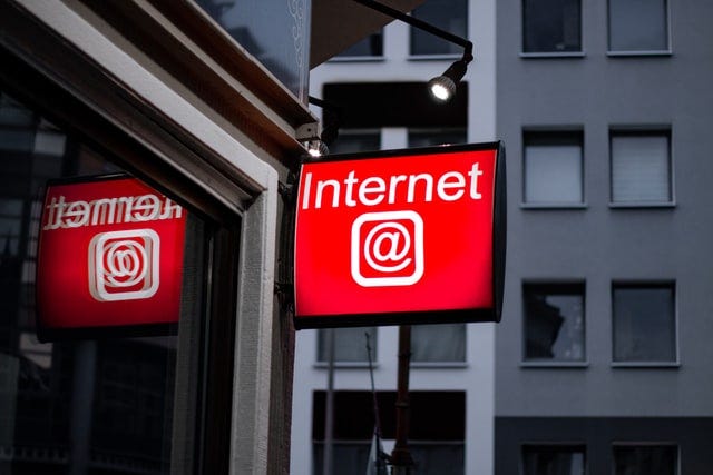 A sign outside that says Internet