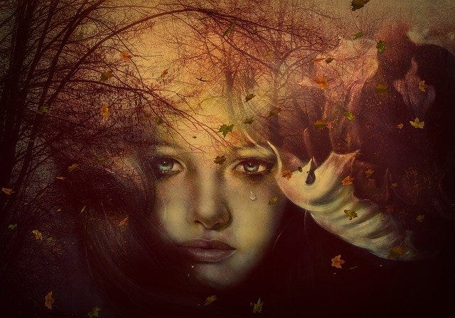 Magical image of young weeping woman