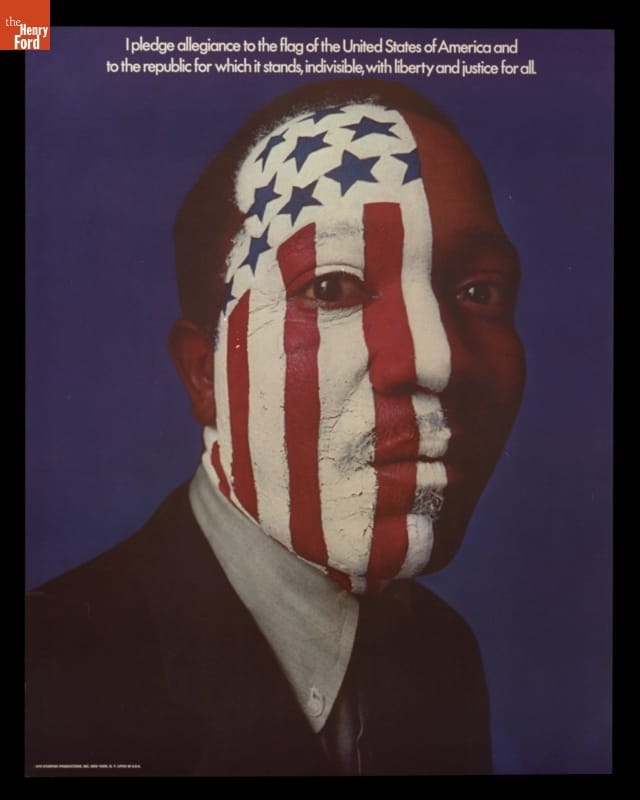 Black man’s face with red & white stripes/blue stars painted on it; excerpts from the Pledge of Allegiance at top of poster.