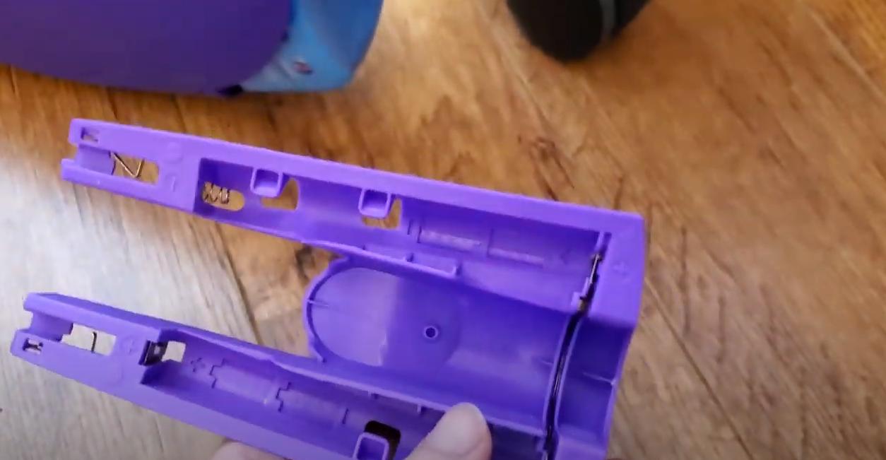 How to Install New Batteries in the Swiffer Wetjet by Thomas Smith