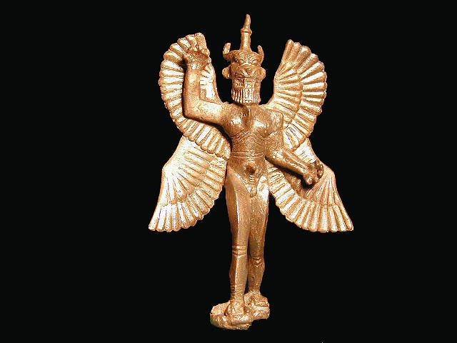 A small, bronze figurine of Pazuzu.
