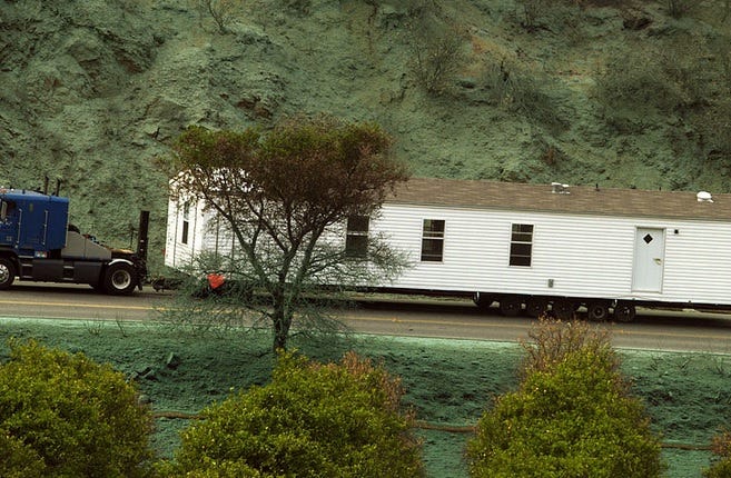 Amanda Bicknell, Public domain, via Wikimedia Commons https://en.wikipedia.org/wiki/Mobile_home#/media/File:FEMA_-_33715_-_A_mobile_home_being_moved_in_California.jpg